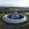 a hidden buddha surrounded by a hill of 150000