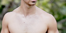 joe jonas showing off his insane body while going